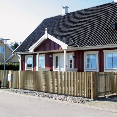 Terndrup stakittet indrammer en have, for familiens sikkerhed